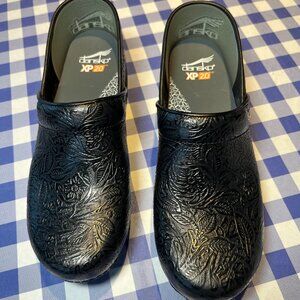 Dansko size 41, women's black tooled clogs